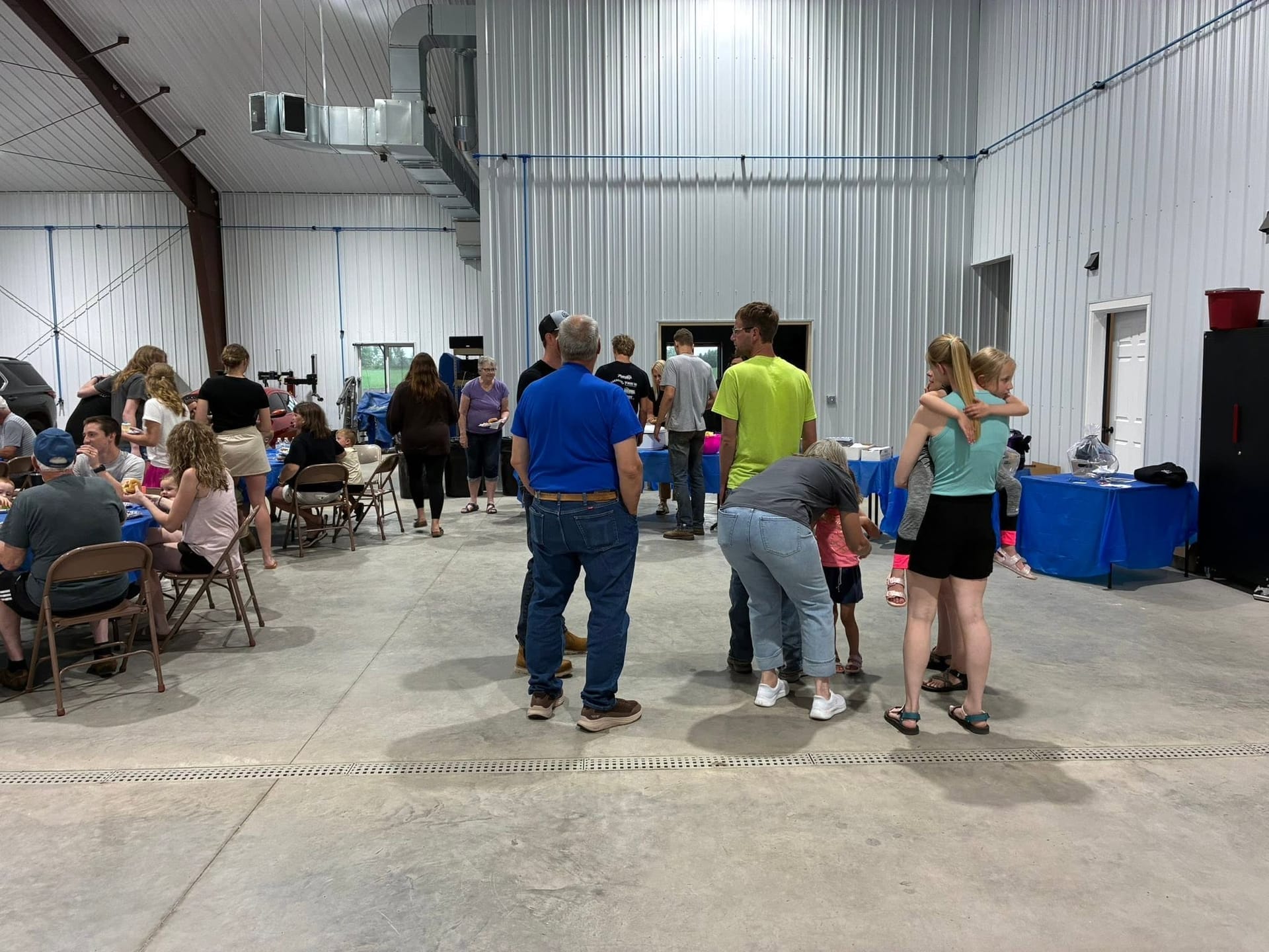 Neighbors gathered inside the shop for the opening day open house